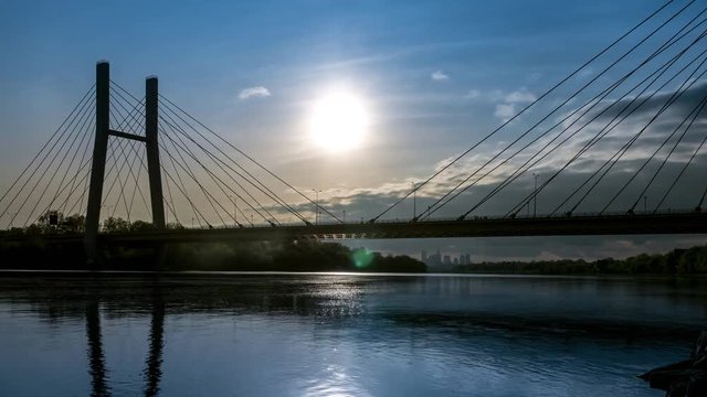 The movement of the sun over the suspension bridge in Warsaw - timelapse