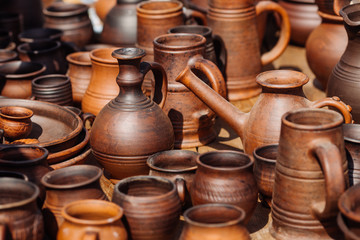 Fototapeta na wymiar Lots of handmade clay pot, bowl and mug.