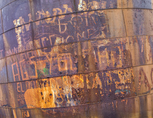 storage tank was with grafitti rusted background