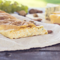 Сheese pie, strudel with cheese, cheese pie 4. Wine, grapes, nuts, cheese, blue cheese, and coffee. dinner, lunch, romantic date, picnic, eating on nature.