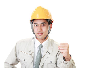 ガッツポーズの労働者