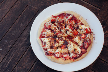 Incredibly delicious strawberry pizza . Pizza with strawberries