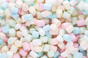 Background or texture of colorful mini marshmallows.