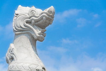 Obraz premium Singha at Wat Trimit, Bangkok, Thailand. Famous for its gigantic