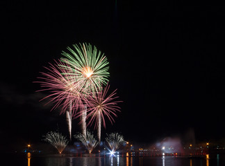 Naklejka premium Fireworks light the night sky and beautiful.