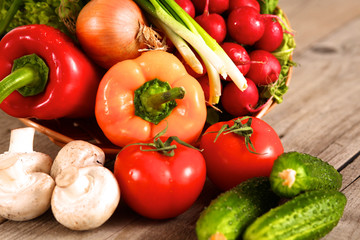 Vegetables . Fresh Bio Vegetable in a Basket. Over Nature Background