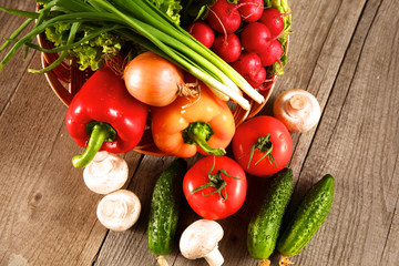 Vegetables . Fresh Bio Vegetable in a Basket. Over Nature Background