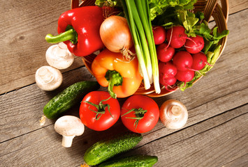 Vegetables . Fresh Bio Vegetable in a Basket. Over Nature Background