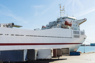 White cargo ship and containers, Barcelona