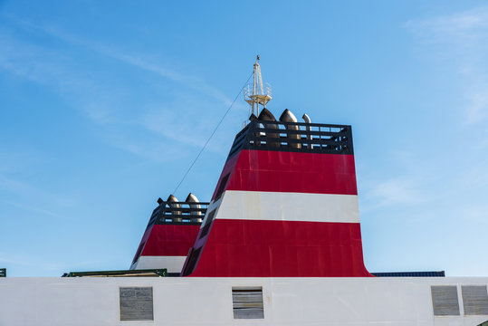  Red chimneys of a cargo ship