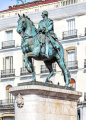 Fototapeta na wymiar Statue of Carlos III at Puerta del Sol (Gateway of the Sun), Mad