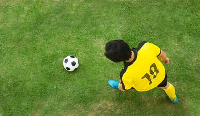 Foto op Plexiglas Top View Of Football Player. © sirikornt