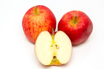 Red apple  and slice on a white background.