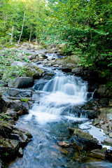 Fototapeta premium Stream with waterfalls.