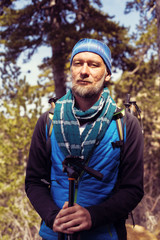 Portrait of a tired bearded hiker