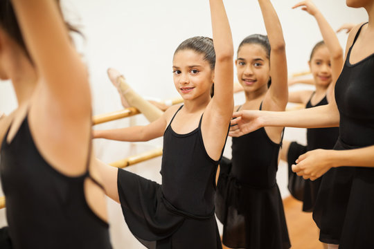 Pretty Girl Enjoying Her Ballet Class At School