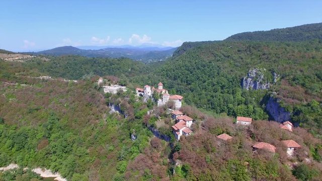 Aerial view of Motsameta monastery near Kutaisi, Georgia. Camera flies on drone above mountains and monastery