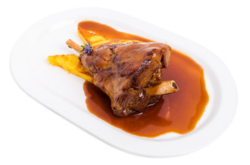 Fried lamb shank with polenta.