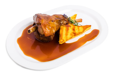 Fried lamb shank with polenta.