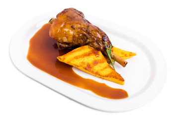 Fried lamb shank with polenta.