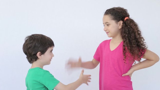 kids negociate and shake hands