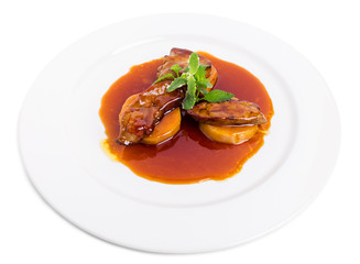 Delicious goose foie gras on baked pears.