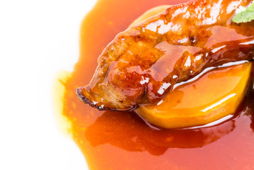 Fototapeta na wymiar Delicious goose foie gras on baked pears.