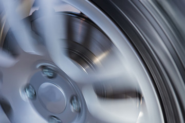 car wheel and brake disc close up - obrazy, fototapety, plakaty