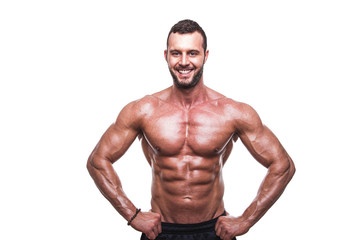 Fototapeta premium Handsome muscular man posing in studio.