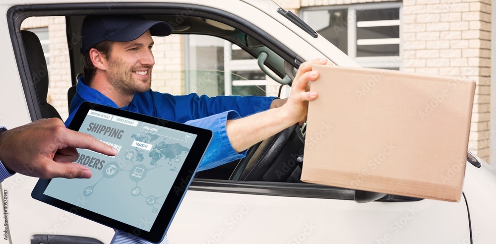 Wall mural Composite image of man using tablet pc 