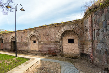 Brick wall of old abandoned bastion in Daugavpils town, Latvia