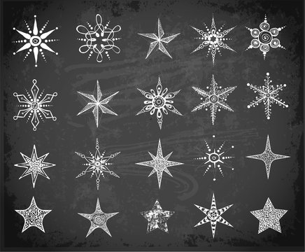 Doodle sketch snowflakes and stars on blackboard. Vector illustration.