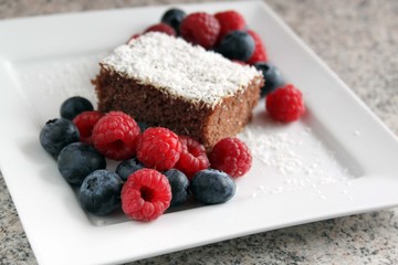 Chocolate cake served with berries