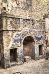 Fototapeta na wymiar The ruins of Herculaneum excavation in Ercolaono near Naples, Italy 