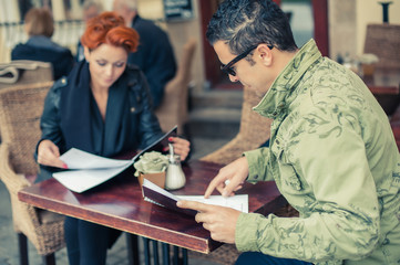 Couple looking at the menu