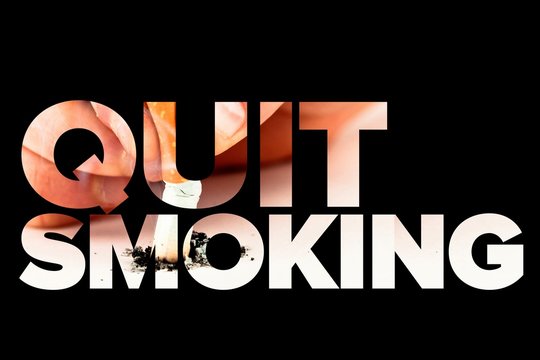 Quit smoking message on a black background