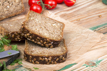 wholemeal bread with sunflower seeds and delicious fresh vegetables