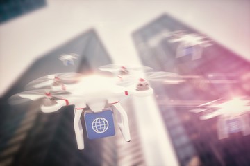 Composite image of digital image of a drone holding a cube