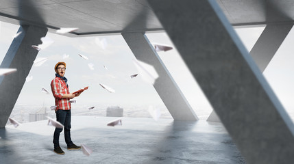 Fototapeta premium Hipster guy with book in hands