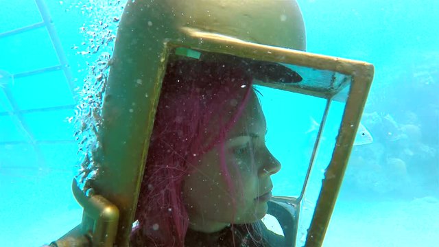 Girl in the helmet at the Bermuda Helmet Diving tour. Bermuda