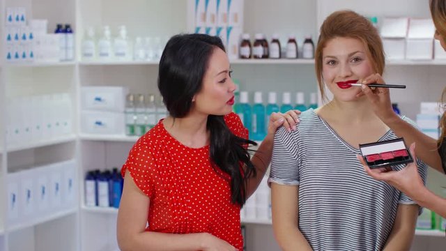  TV presenters on shopping channel selling beauty products & talking to camera