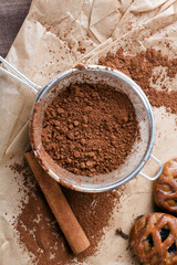 cinnamon, cocoa powder and anise on baking paper