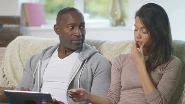  Couple with financial problems doing household accounts