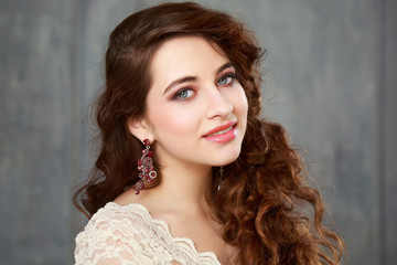 Happy teen girl with prom make-up and hairstyle © Embrace of Beauty