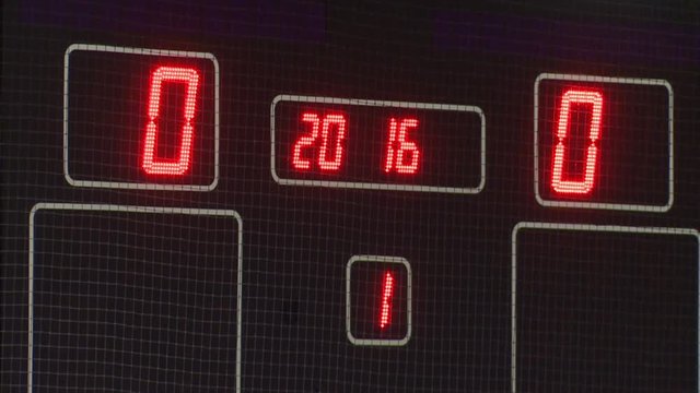 The score was 0-0 on the scoreboard.The red numbers on the electronic scoreboard.