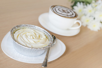 Milk cake with hot coffee
