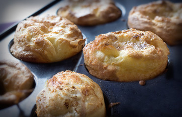 closeup of freshly baked yorkshire pudding in a pan