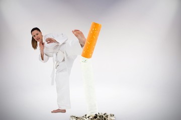 Composite image of fighter performing karate stance