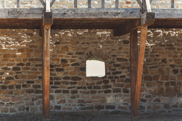 Fragment of fortress wall with porthole