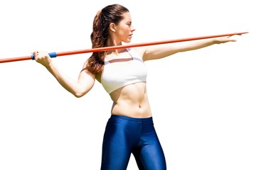 Front view of sportswoman is practising javelin throw 